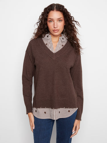 Brown sweater featuring a striped poplin shirt collar, paired with jeans, by Charlie B.