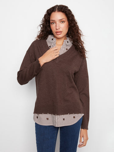 Relaxed fit brown sweater layered over a striped poplin hem and jeans, by Charlie B.