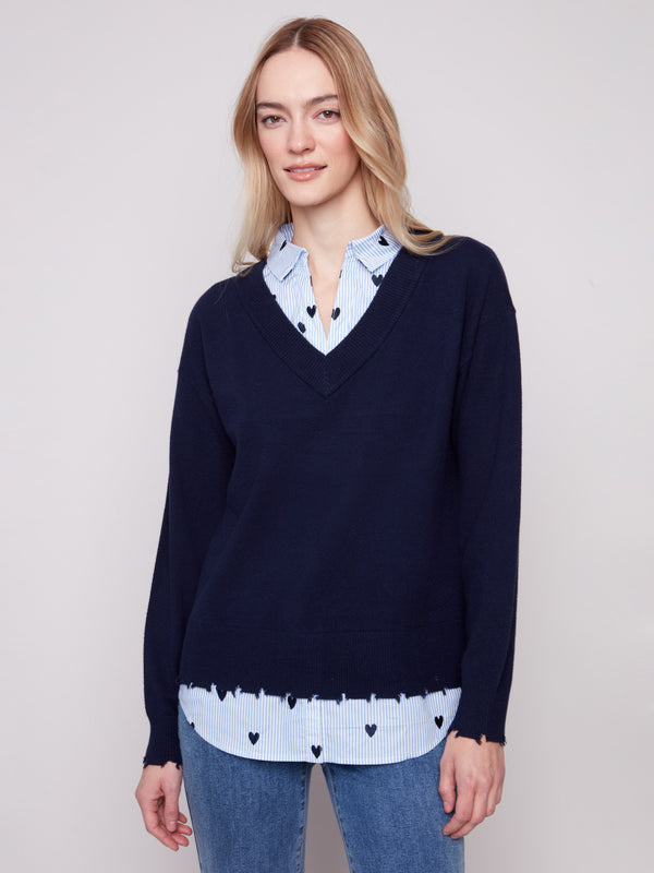 Navy sweater with a V-neck and poplin shirt collar, featuring long sleeves for a timeless style by Charlie B.