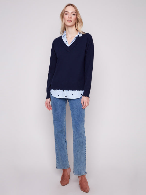 Chic navy sweater with side slits and embroidered hearts, offering a unique layered design by Charlie B.