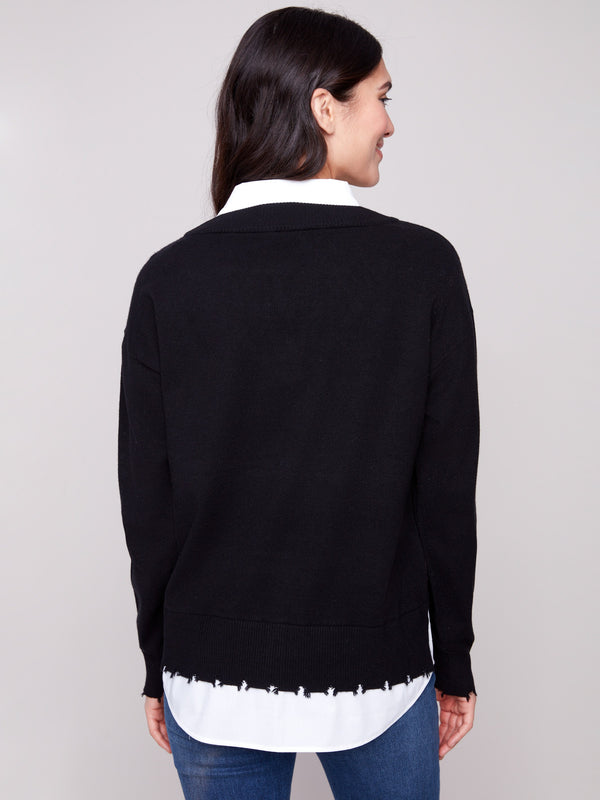 Elegant black sweater showcasing a frayed finish at cuffs and hem, complete with a faux shirt collar by Charlie B.