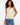 Gold sweater cami with a charming white heart detail, perfect for a chic look by Charlie B.