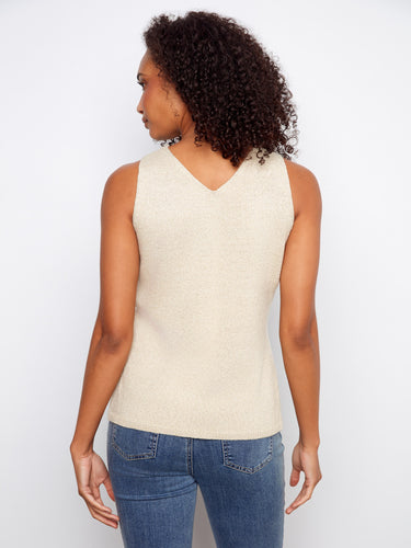 Sophisticated V-neck sweater cami in gold, showcasing a cute white heart embellishment by Charlie B.