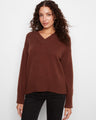 Cozy sweater featuring a flattering V-neckline, perfect for layering in cooler weather. By Charlie B.