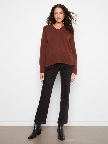 Ribbed details on this sweater offer texture and style, ideal for casual or dressy occasions. By Charlie B.