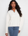 Sweater featuring a V-notch neckline with woven trim, offering a stylish touch to any casual outfit by Charlie B.