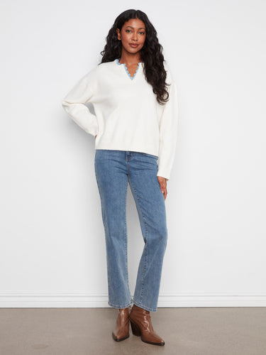 This cozy sweater is designed with drop shoulders for added comfort and a relaxed silhouette by Charlie B.