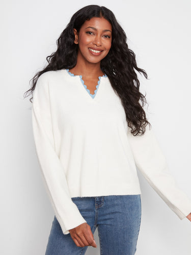 Enjoy the relaxed fit of this sweater, perfect for layering over your favorite tops by Charlie B.