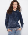 This hoodie features a washed effect with long sleeves, adding a trendy touch to your casual wardrobe by Charlie B.