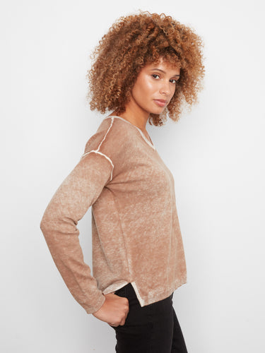 Designed with long sleeves, this knit offers warmth and style in equal measure, ideal for cooler days. By Charlie B.