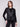 Fashionable black jacket showcasing faux pockets with zippers, adding flair by Charlie B.