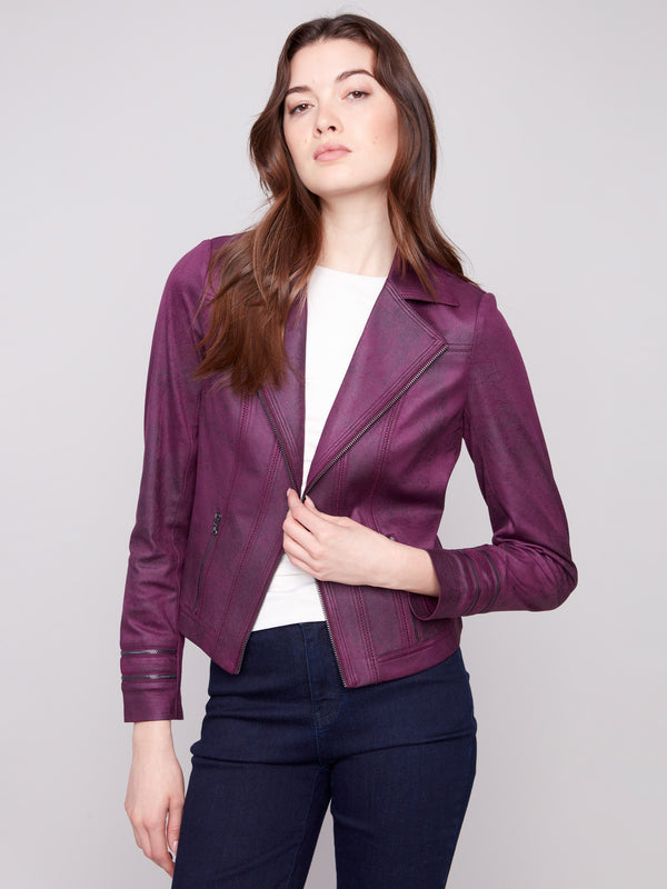 Short length berry faux leather jacket with distinctive zipper details enhancing its edgy style by Charlie B.
