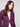 Stylish berry faux leather jacket showcasing sophisticated zipper details and lapel collar by Charlie B.