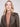 Chic spruce faux leather jacket showcasing modern zipper accents by Charlie B.
