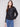Black faux leather jacket featuring a sleek hook-and-eye closure by Charlie B.