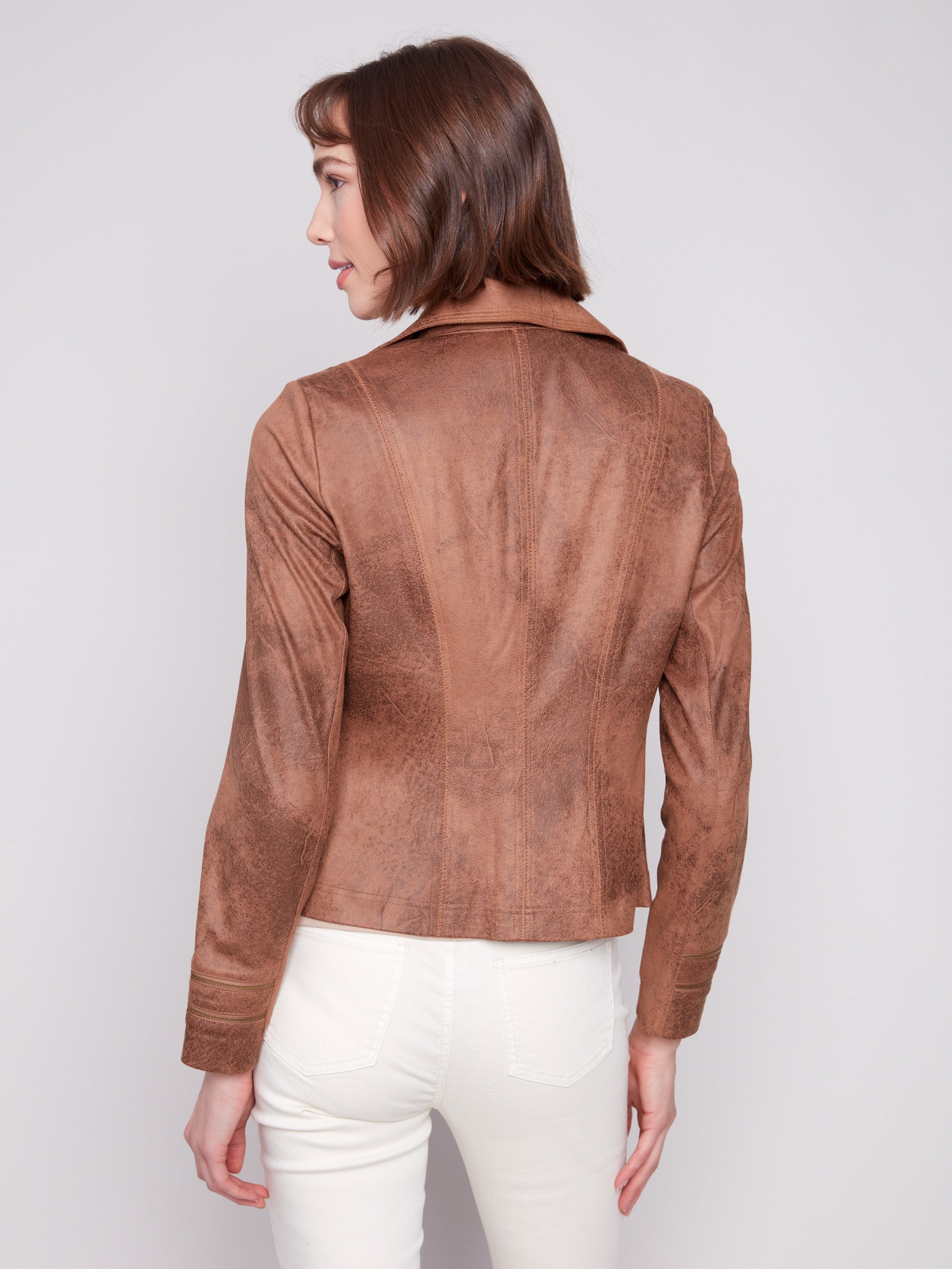 Elegant truffle-colored faux leather jacket featuring sleek zipper embellishments with a modern flair by Charlie B.