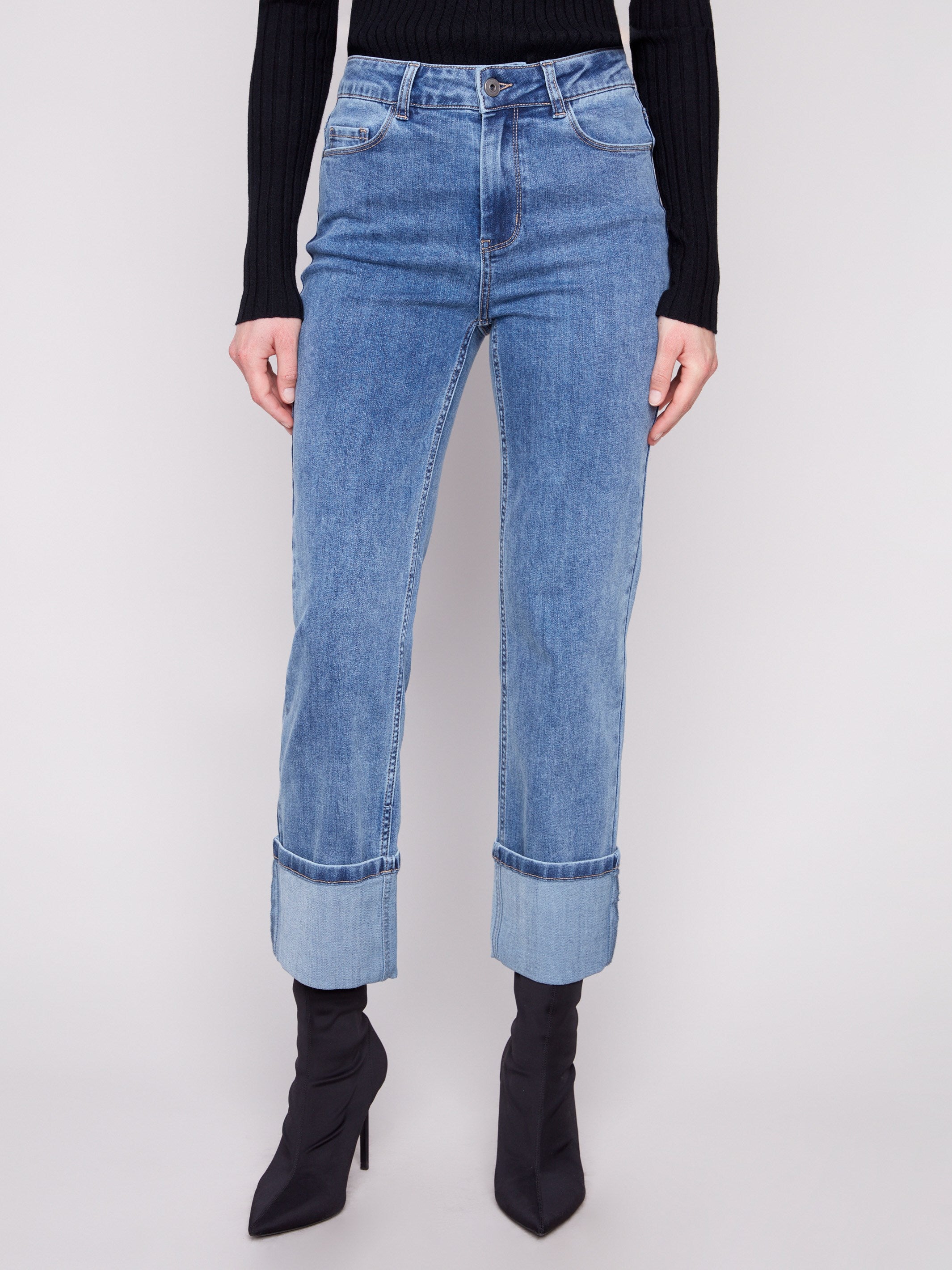 Blue cropped jeans with wide cuffs, designed in a regular rise and classic five-pocket style for versatile looks by Charlie B.