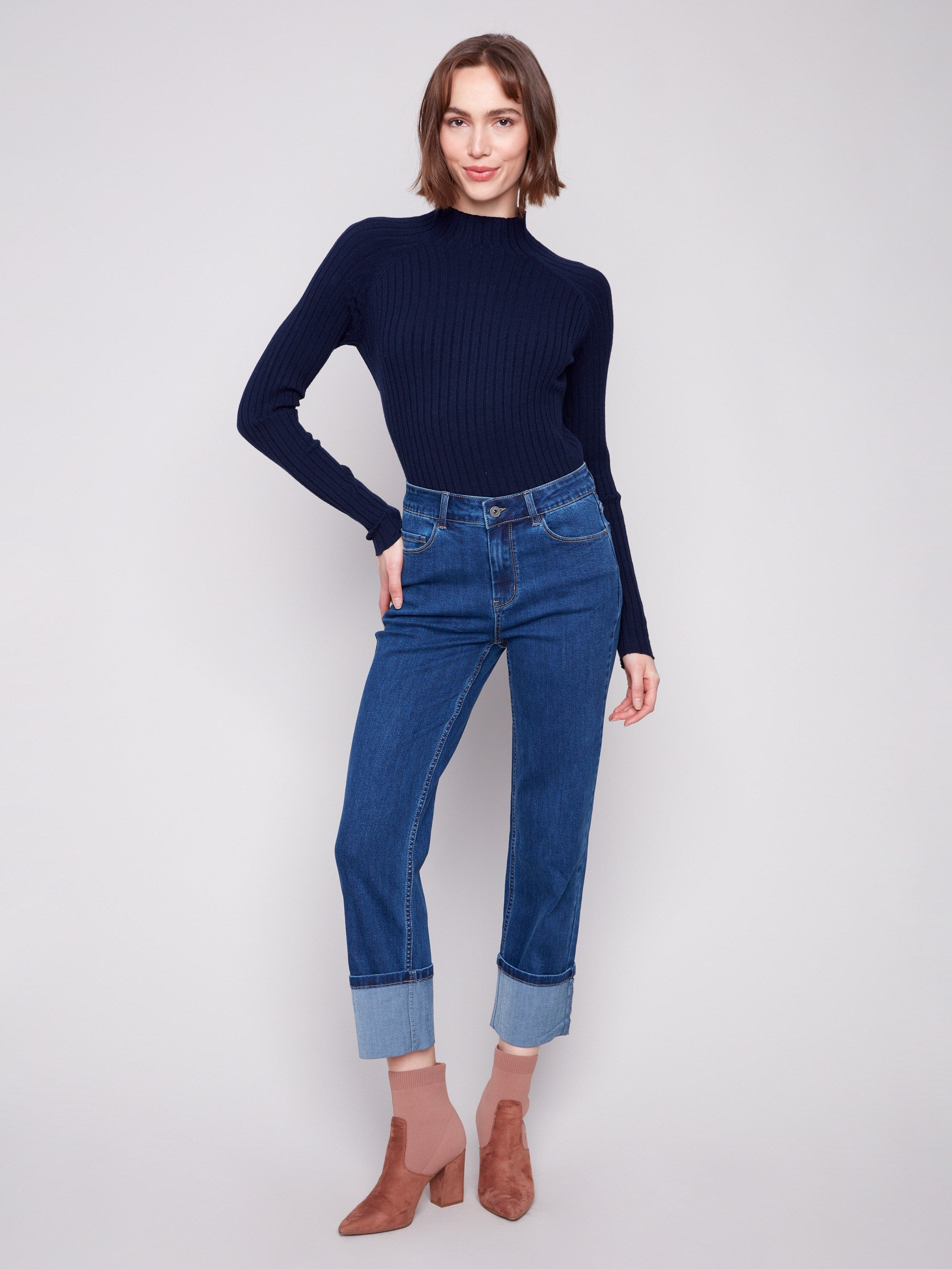 Indigo jeans with a straight fit, showcasing a stylish wide cuff at the hem and crafted from stretch denim by Charlie B.