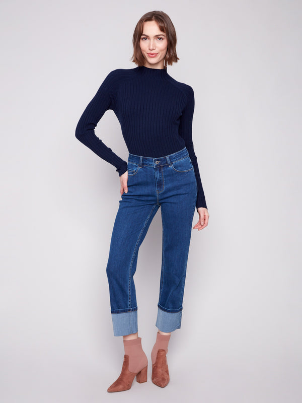 Indigo jeans with a straight fit, showcasing a stylish wide cuff at the hem and crafted from stretch denim by Charlie B.