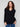 Elegant black V-neck sweater with buttons at the sides, adding a unique flair to this classic piece by Charlie B.