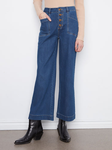 Ankle length denim pants featuring stylish patch pockets and a comfortable fit. By Charlie B.
