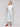 Stylish cropped denim pants with scallop embroidery and ample pocket space by Charlie B.