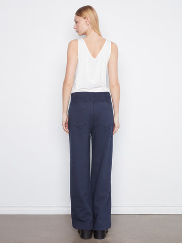 Featuring back patch pockets, these pants blend practicality with a chic design aesthetic. By Charlie B.