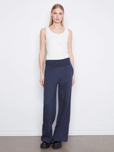 Featuring back patch pockets, these cotton blend pants offer both style and practicality for everyday wear by Charlie B.