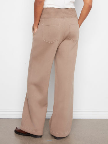 Back patch pockets add a touch of practicality to these chic cotton blend pants by Charlie B.