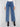 Showcasing a five-pocket design, these blue jeans with heart accents provide both functionality and flair by Charlie B.