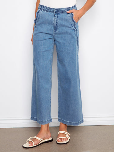 Crafted from stretch denim, these blue wide-leg jeans provide a comfortable fit with elegant scalloped detailing by Charlie B.