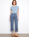 Denim jeans with a wide leg design, featuring a scalloped eyelet hem for added style. Finished by Charlie B.