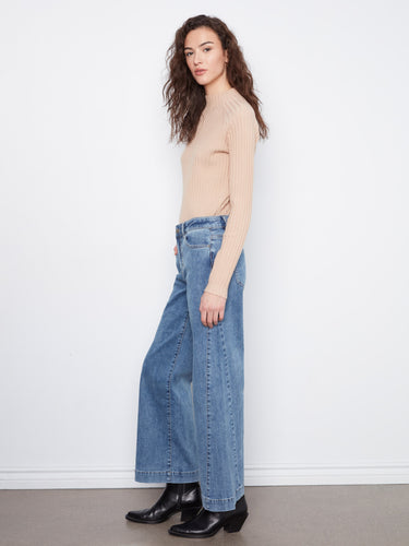 Featuring stylish side panel details, these jeans add flair to any outfit by Charlie B.
