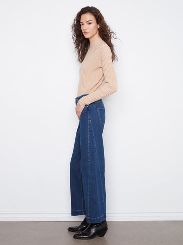 The five-pocket design of these jeans combines functionality with style, ideal for everyday wear. Created by Charlie B.