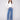 Medium blue jeans featuring a wide leg and five-pocket design, crafted in stretch denim material by Charlie B.