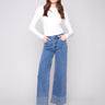 Medium blue jeans featuring a wide leg and five-pocket design, crafted in stretch denim material by Charlie B.