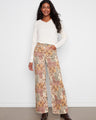 These wide leg pants showcase a beautiful bandana print and are crafted from stretch twill fabric for comfort by Charlie B.
