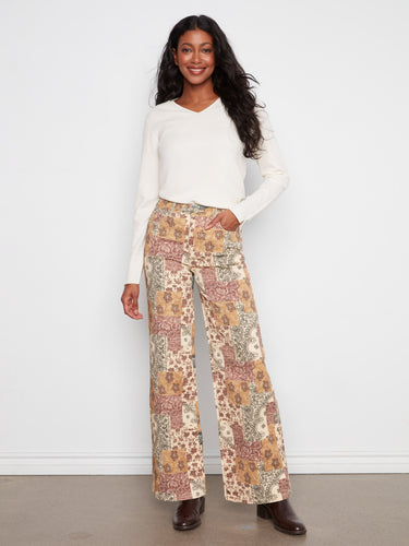 These wide leg pants showcase a beautiful bandana print and are crafted from stretch twill fabric for comfort by Charlie B.