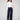 Deep blue jeans with a long length and floral sequin details, offering a chic look by Charlie B.