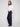 Wide-leg silhouette in rich blue denim with intricate sequin floral patterns for an elevated style by Charlie B.