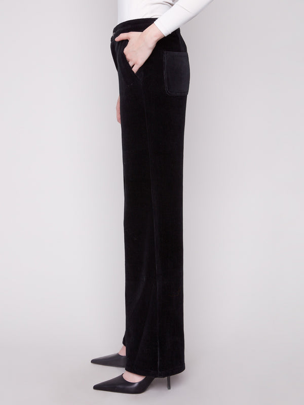 Elegant black corduroy pants with a regular rise and chic design by Charlie B.