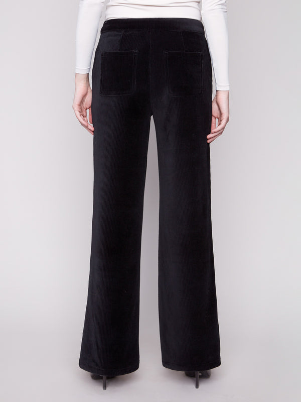 Sleek black wide-leg pants made from comfortable stretch corduroy fabric by Charlie B.