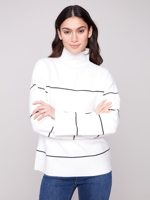 Ecru sweater with black stripes featuring a relaxed fit and cozy funnel neck, perfect for casual wear by Charlie B.