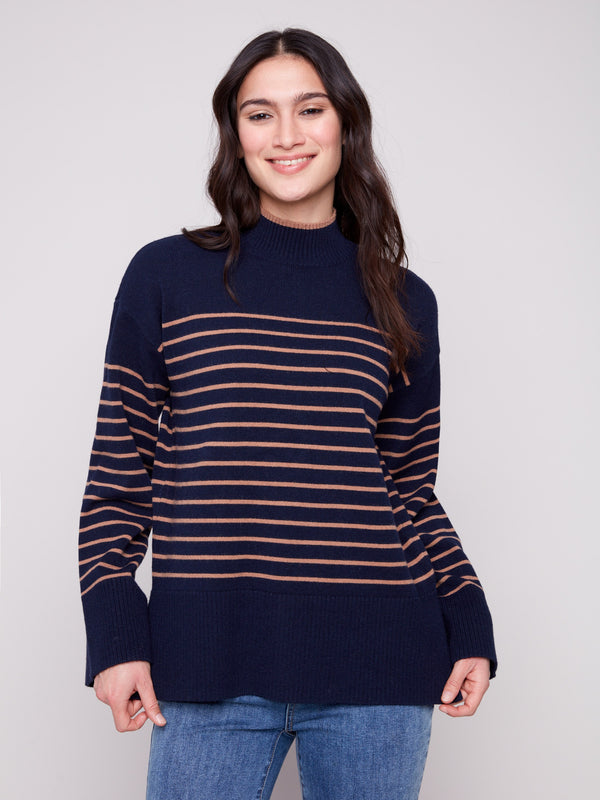 Navy blue striped sweater featuring a chic mock neck design with drop shoulders for a relaxed look by Charlie B.