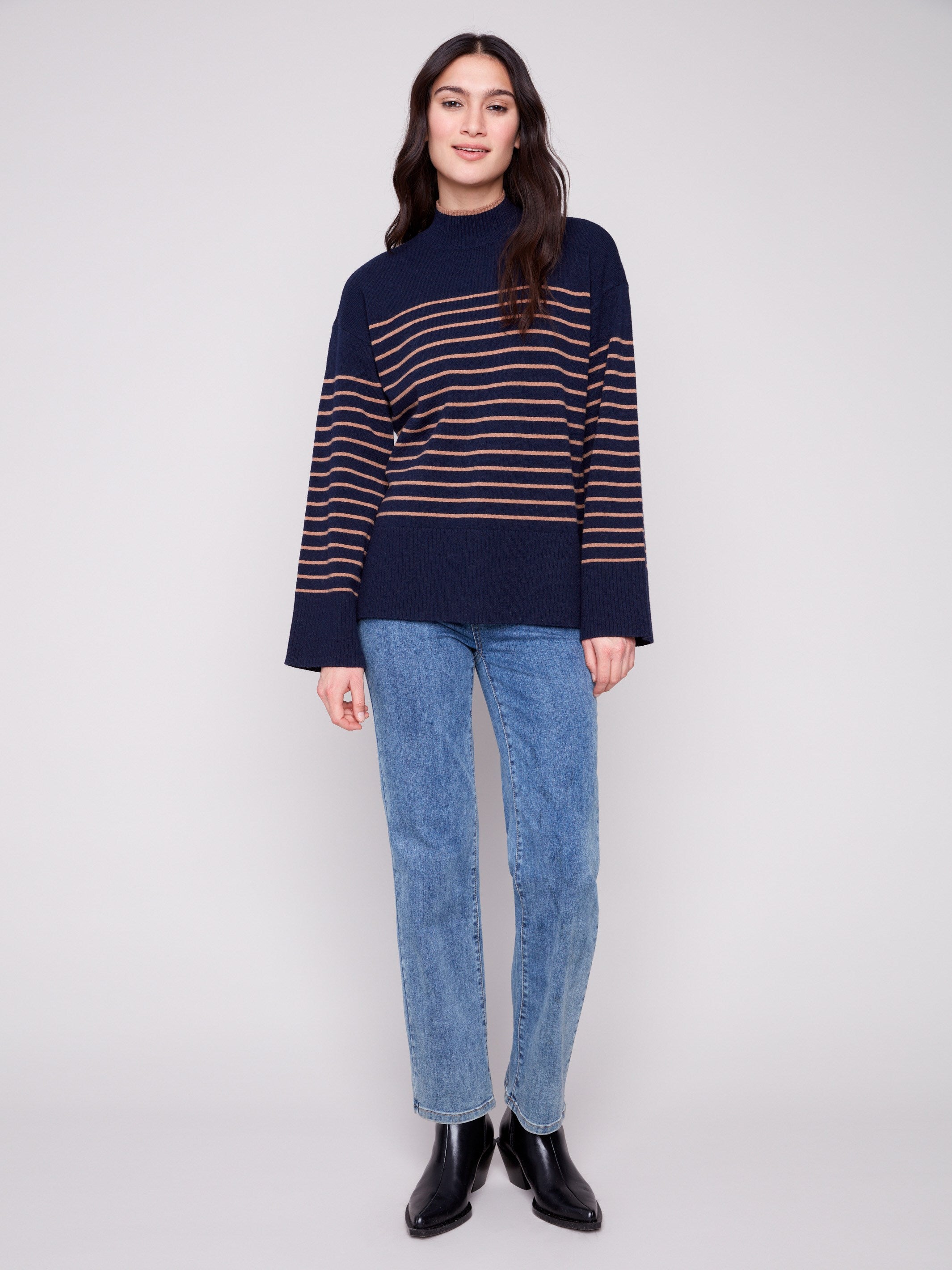 Stylish navy sweater with wide cuffs and elegant stripes, perfect for casual outings by Charlie B.