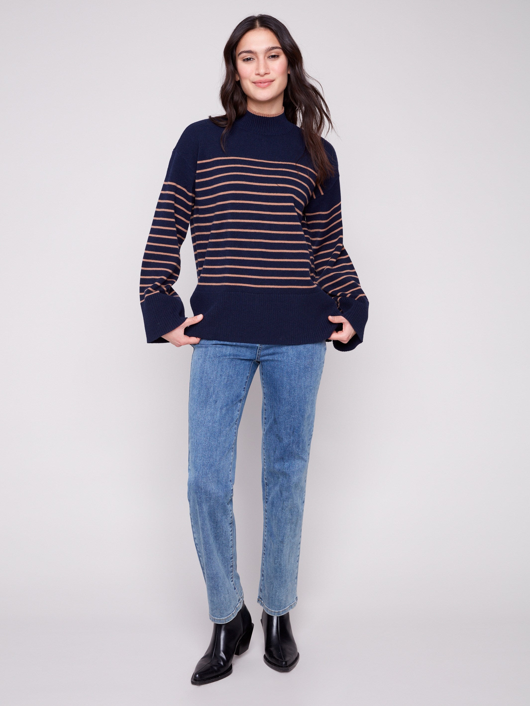 Elegant navy striped sweater with comfortable drop shoulders and modern style by Charlie B.