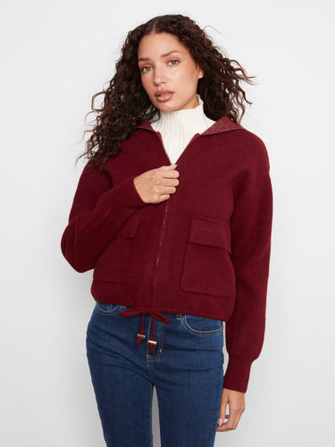 The zip-front closure on this jacket offers both convenience and a sleek look, making it perfect for everyday wear. By Charlie B.