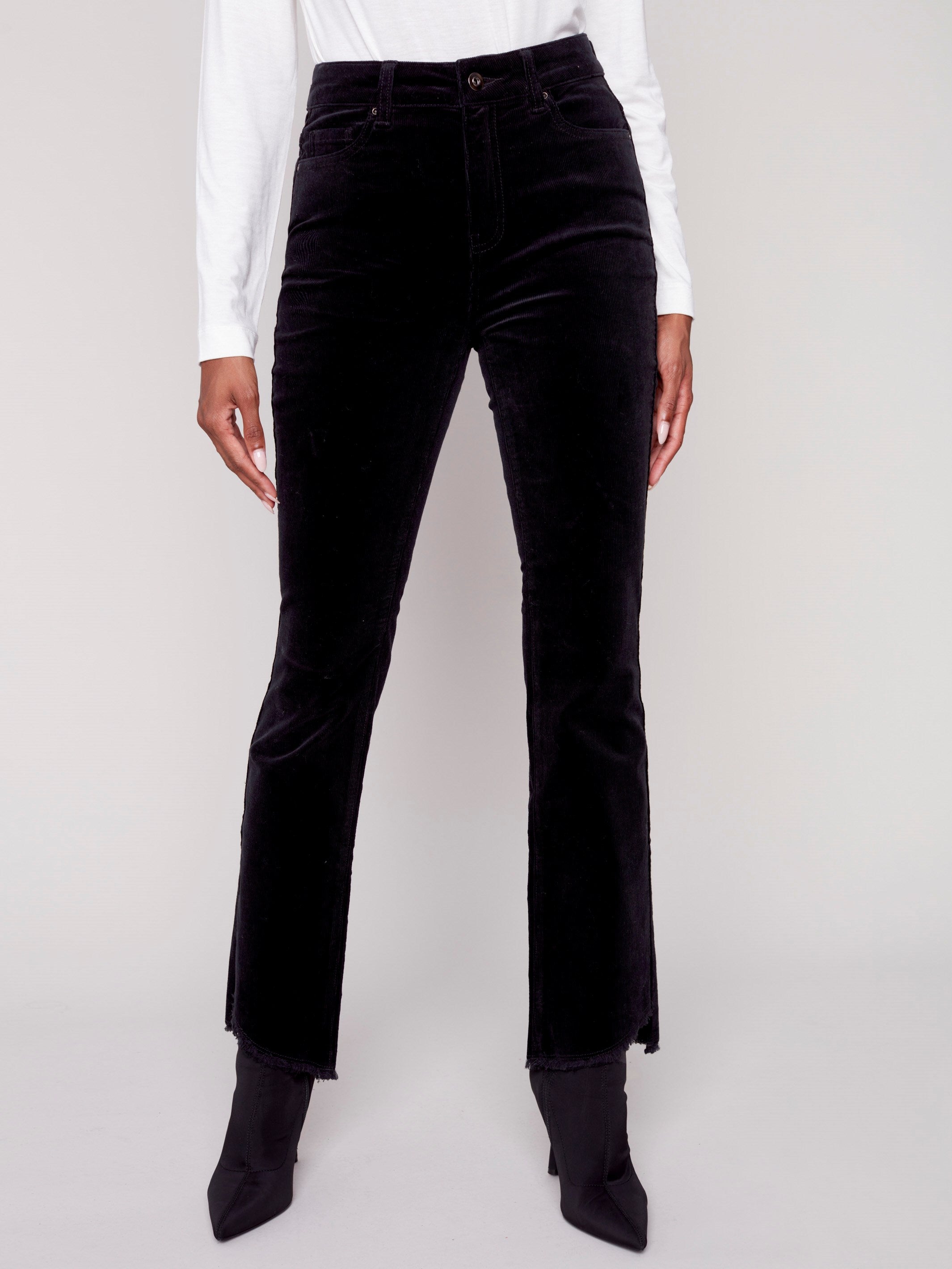 Pantalons semi-évasés en velours côtelé avec ourlet asymétrique effrangé - Noir