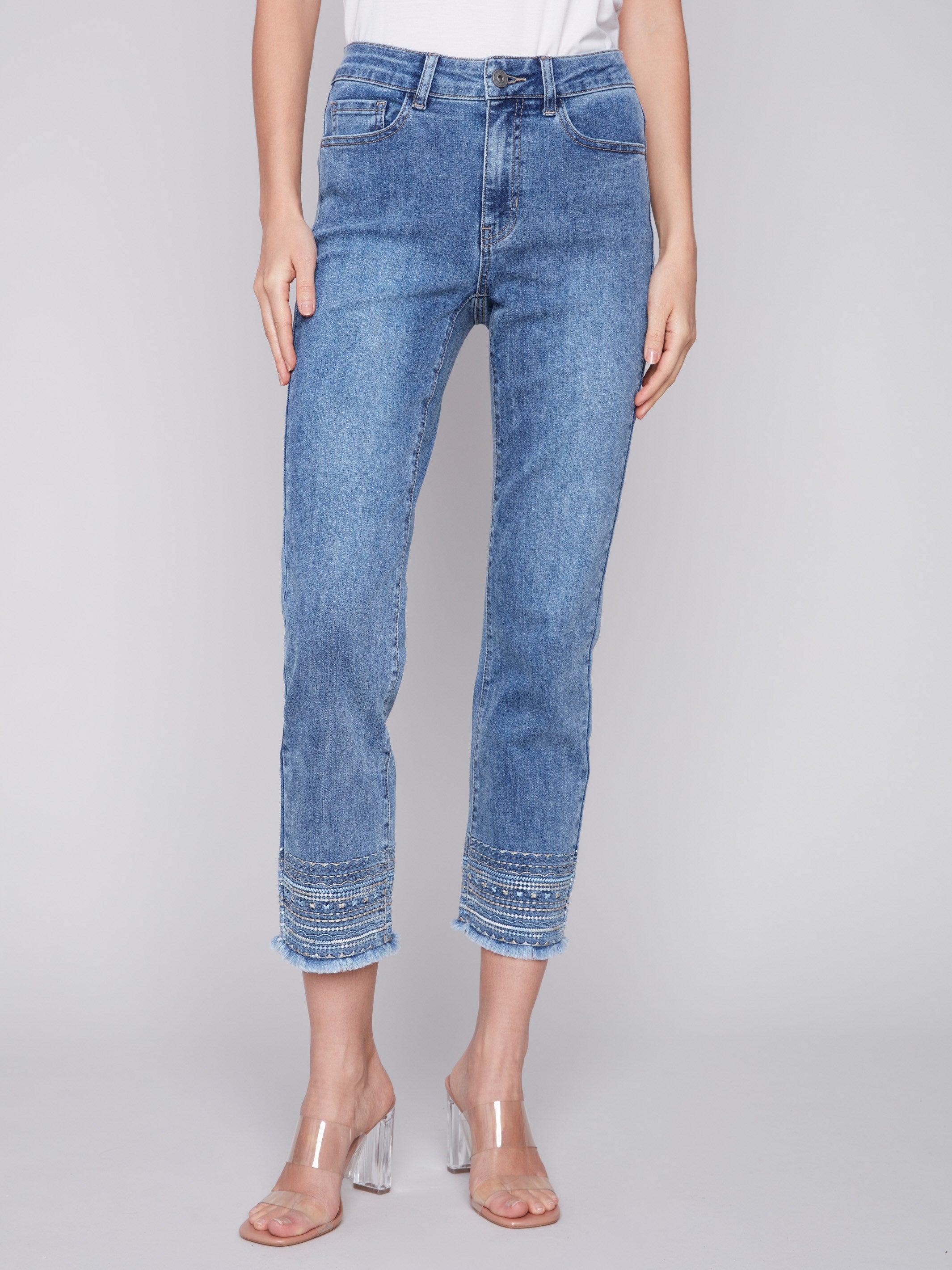 Slim leg embroidered hem jean